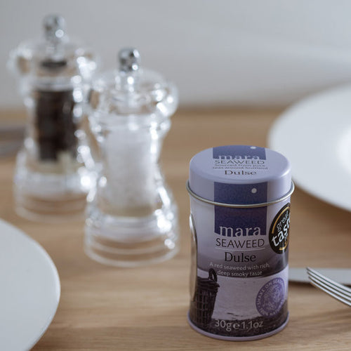 Mara Seaweed Dulse on table with salt and pepper